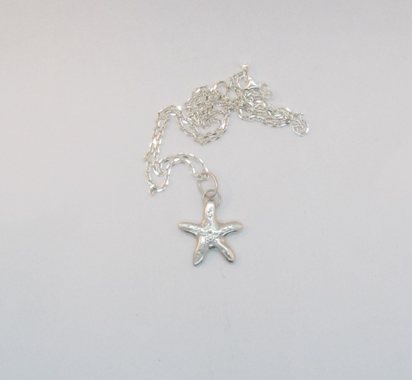 COLLIER PENDENTIF ÉTOILE ÉTOILÉE