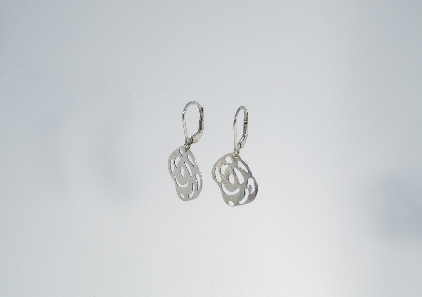 BOUCLES ROSES FERMÉES